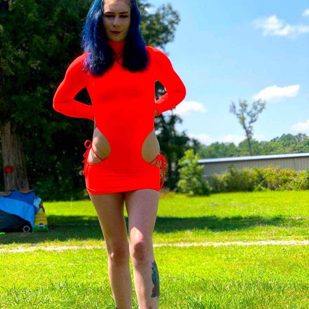 Neon Orange long sleeve Prix Dress with cut out hips